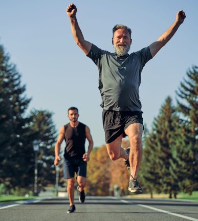 The,Old,And,Young,Sportsmen,Running,On,The,Road